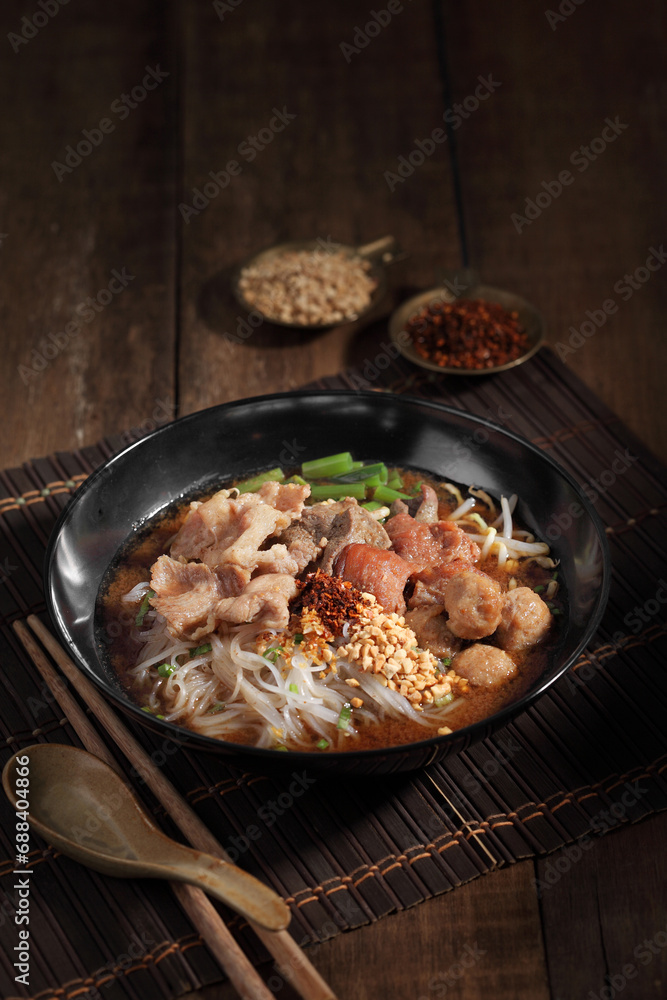 Chinese beef noodle soup. Taiwanese beef noodle on wooden background. Chinese beef noodle soup. Taiwanese beef noodle on wooden background.