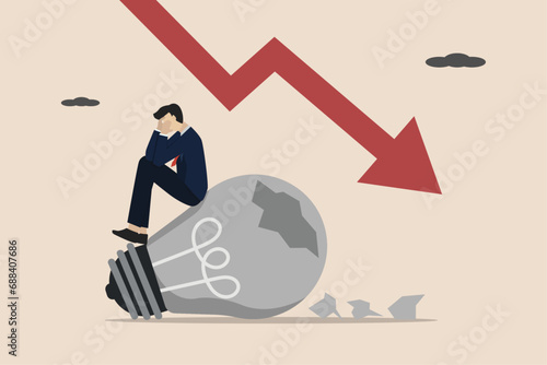 Giving up, business failure, failed entrepreneur, work mistakes or failed business concept, stop working or give up, businessman sitting depressed on broken idea light bulb.