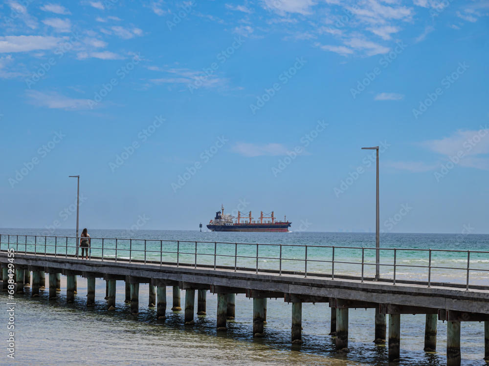 Freighter Past Pier