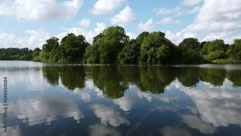 Picturesque view of the riverside at Mote Park, situated at Maidstone, Kent in United Kingdom. Picturesque view of the riverside at Mote Park, situated at Maidstone, Kent in United Kingdom.