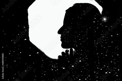 silhouette of a lady. Water drops on the glass. Black and white. profile of woman. Night.