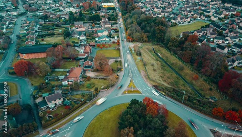 Timelapse of a roundabout and its busy traffic located in a the town of Thetford, in Breckland, Norfolk, in United Kingdom. photo