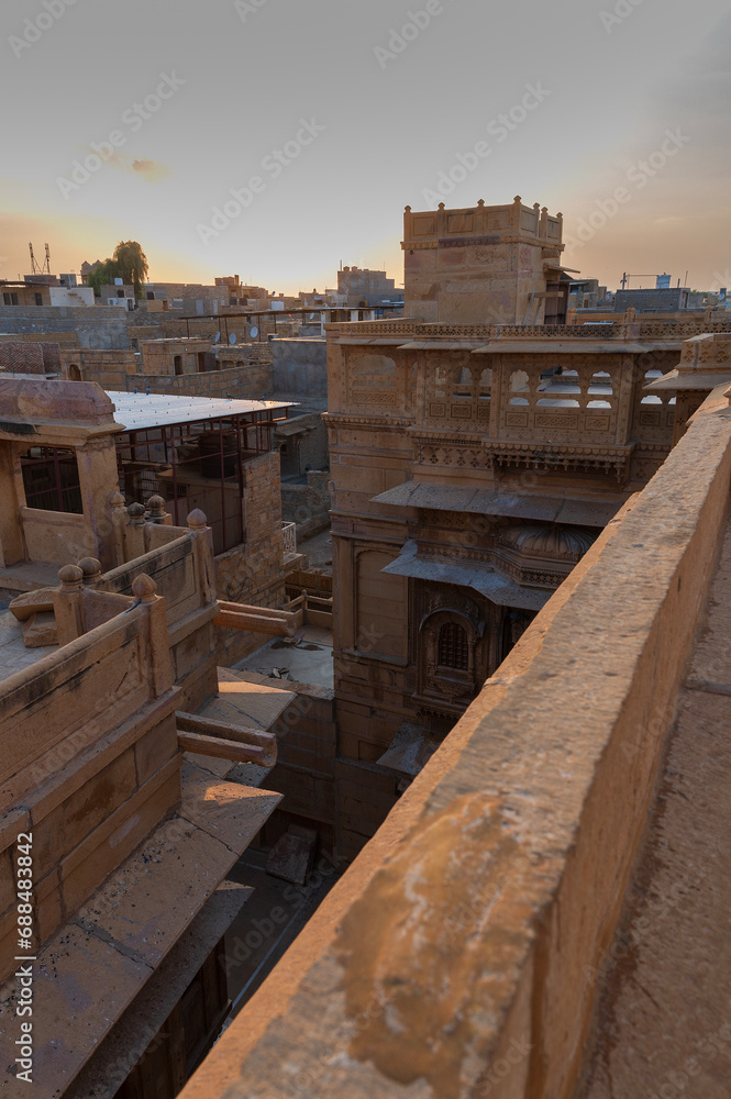 Jaisalmer, Rajasthan, India - 16 th October 2019 : View of buildings of Jaisalmer city from the roof top of Patwon ki Haveli, ancient palace and UNESCO world heritage building.