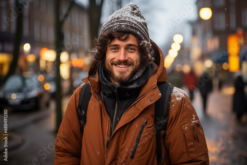 portrait of happy man in a winter clothes outdoors