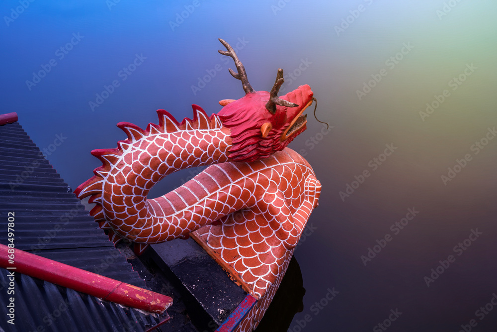 Naklejka premium Dragon boat on the lake