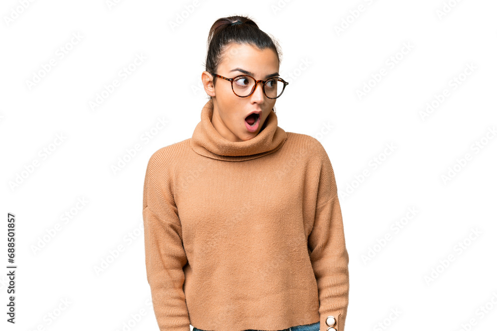 Young beauty woman over isolated chroma key background doing surprise gesture while looking to the side Young beauty woman over isolated chroma key background doing surprise gesture while looking to the side