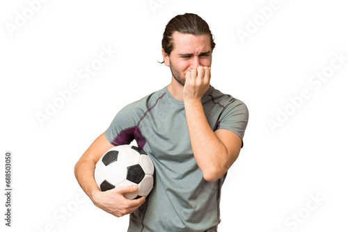 Young handsome football player man over isolated background having doubts