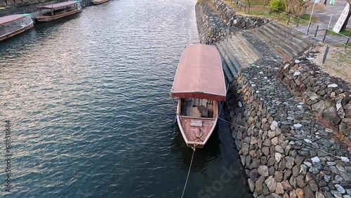 View on a traditional japanese boat in a river. photo