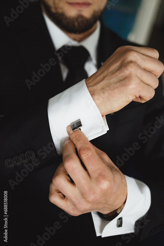 wedding man hands cufflinks jacket