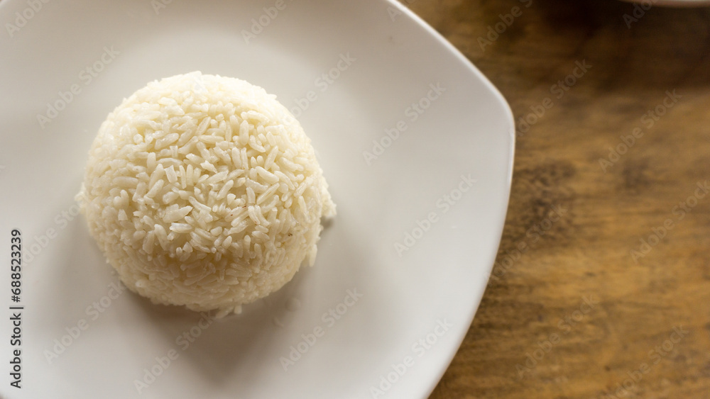 healthy food concept. Top view of white rice on white plate. copy space. cooked rice