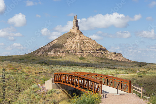 The bridge leading to Chimney Rock, a geological rock formation in the North Platte River valley photo