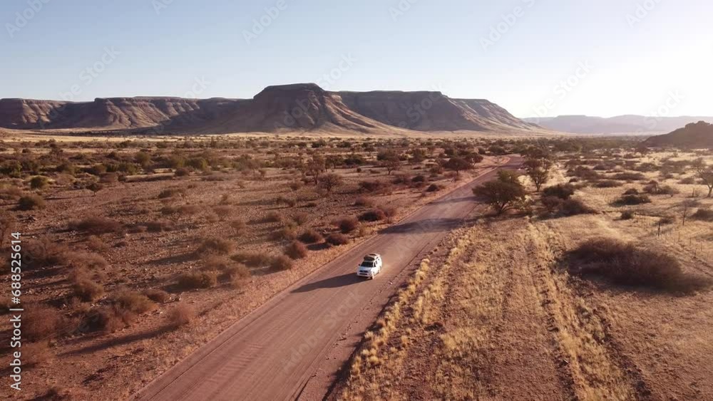 Adventure Across Endless Dunes: 4K drone shot of Desert Drive in Namibia, Africa with Rooftop-Tented 4x4 Toyota Hilux; Epic Off-Road Journey for Travel, Exploration, and Outdoor Enthusiast Videos Adventure Across Endless Dunes: 4K drone shot of Desert Drive in Namibia, Africa with Rooftop-Tented 4x4 Toyota Hilux; Epic Off-Road Journey for Travel, Exploration, and Outdoor Enthusiast Videos