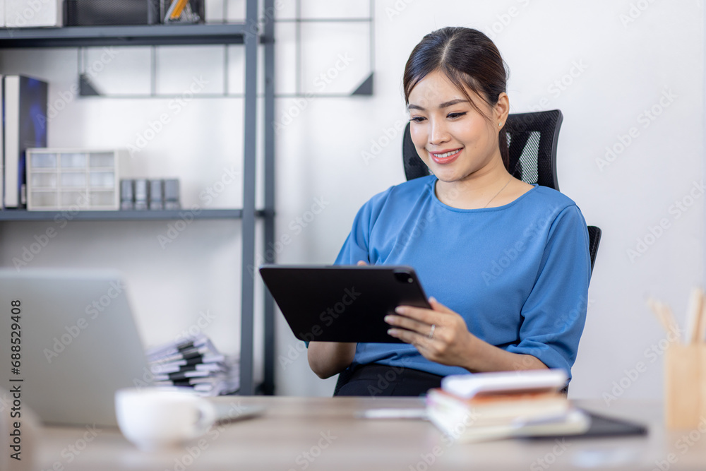 Asian Business woman work in home. concept of tax, report, accounting, statistics, and analytical research. Asian Business woman work in home. concept of tax, report, accounting, statistics, and analytical research.