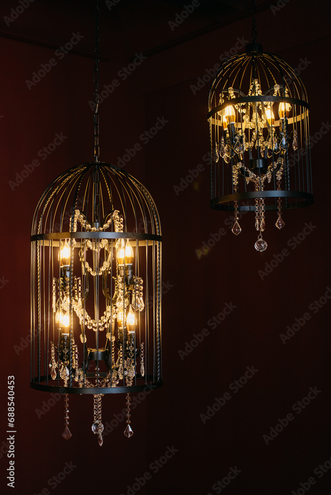 A chandelier in the form of a cage. Vintage lamp