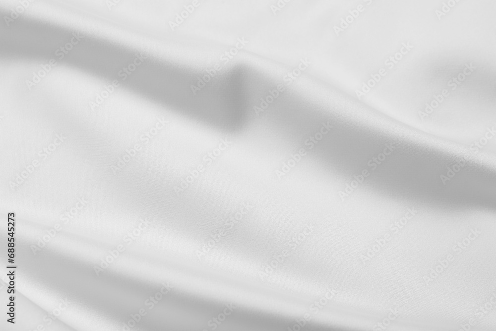 Texture of white silk ripple fabric as background, top view