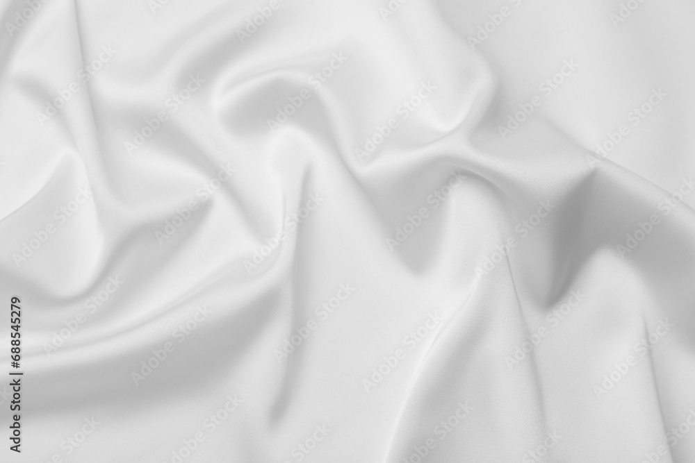 Obraz premium Texture of white silk ripple fabric as background, top view