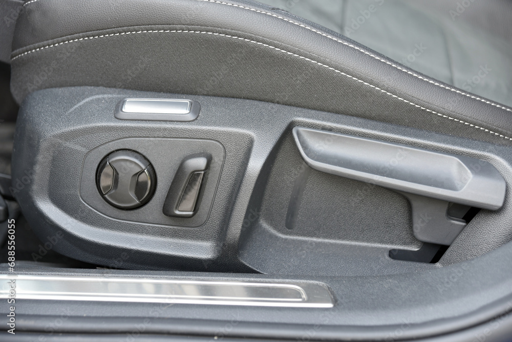 Buttons for adjusting seat position Buttons for adjusting seat position