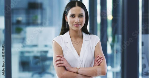 Woman, arms crossed and confident with face, office and professional, employee and leader. Portrait, young and workplace for career, financial clerk and businesswoman for startup, job and elegant photo