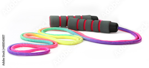 Jumping rope on a white background. Sports equipment jump rope for weight loss. photo