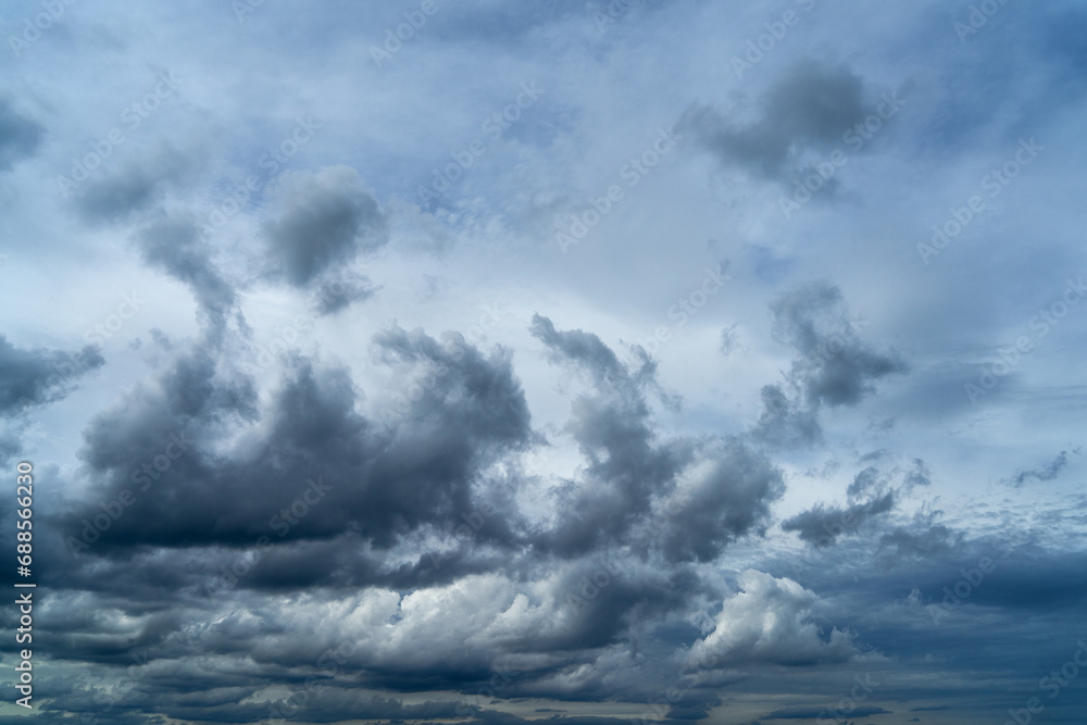 Cloudy sky with dark clouds in thunderstorm Cloudy sky with dark clouds in thunderstorm