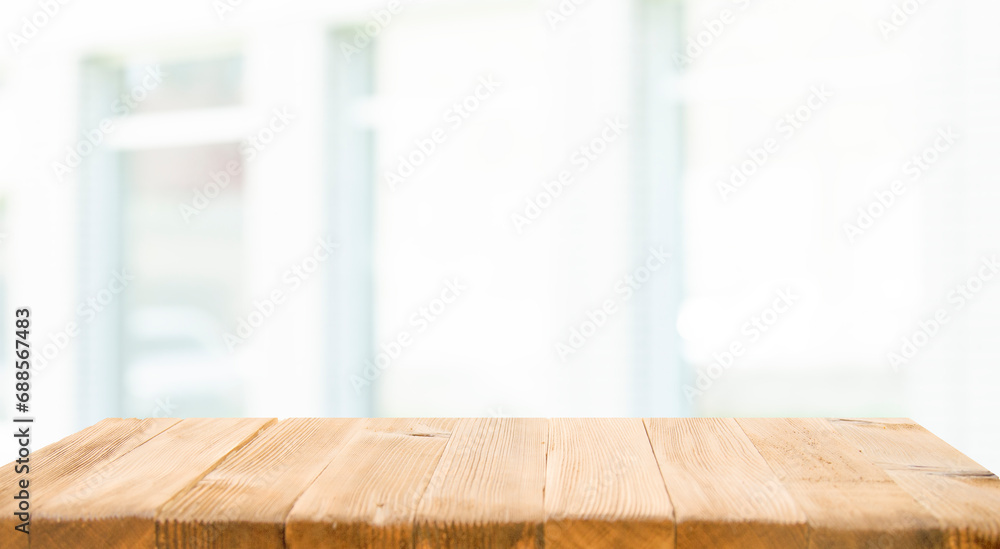Perspective light empty wooden table from above on blurred background can be used mockup to display installation products or design layout. Perspective light empty wooden table from above on blurred background can be used mockup to display installation products or design layout.