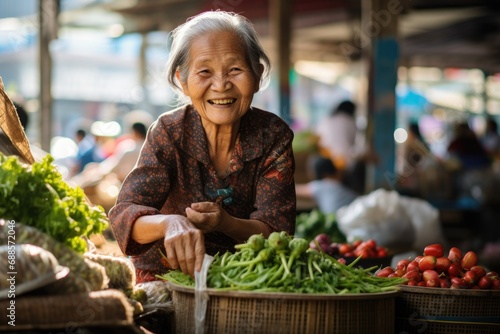 Elderly asian lady on the food market © Lubos Chlubny