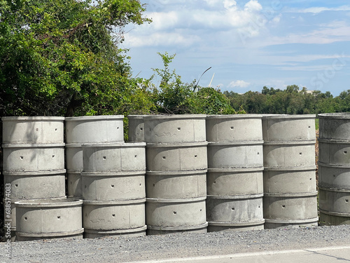 large concrete barrel on a green grass