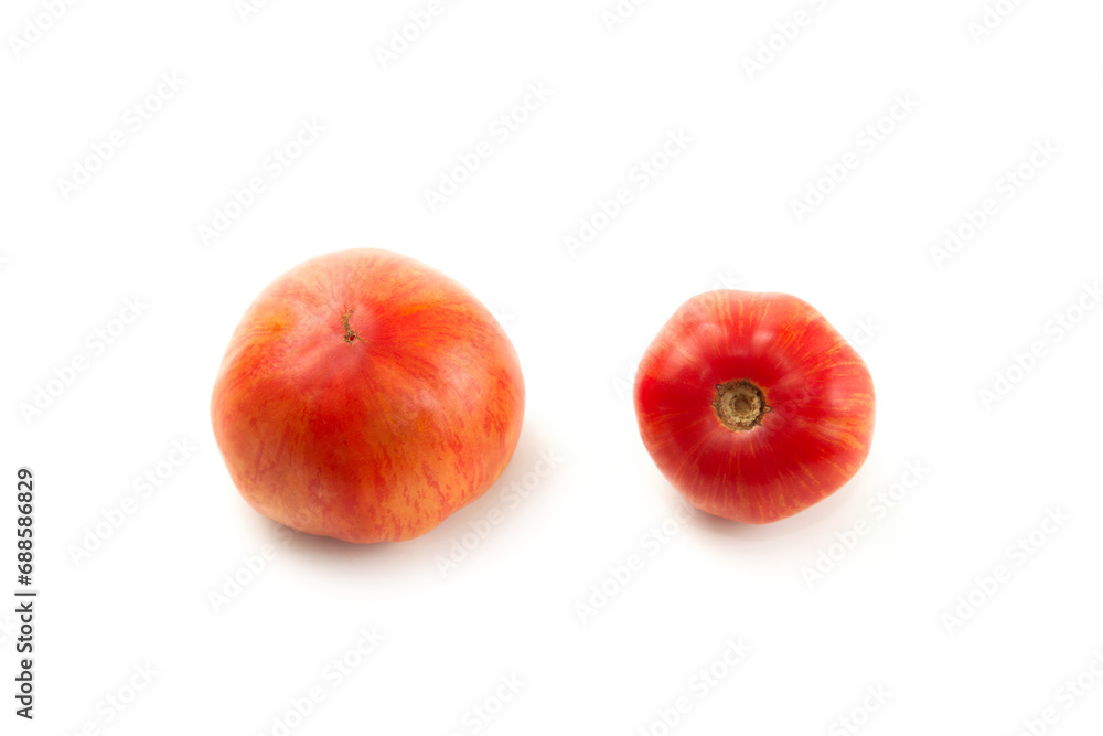 Two pink tomatoes isolated on white background with clipping path. . Two pink tomatoes isolated on white background with clipping path. .