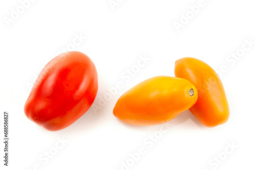 Assort of different shape and color of tomatoes isolated on white background with clipping path. . © kostik2photo