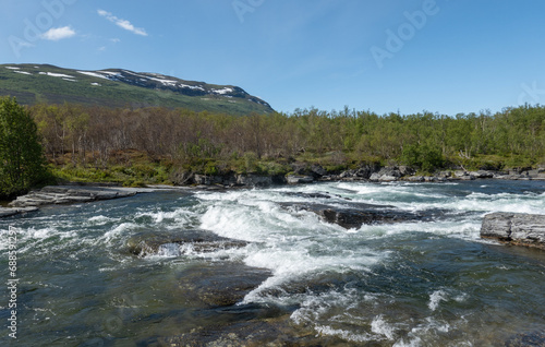 Watercourse in Abisko National Park in Lapland, northern Sweden. © leiing