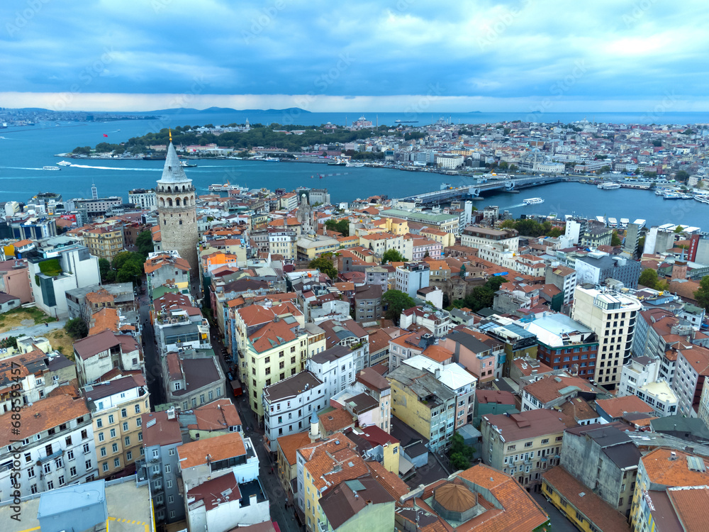 Fototapeta premium Drone view of the Galata Tower, historical center of Istanbul, Bosphorus and Golden Horn. Urban landscapes of Istanbul, Turkey.