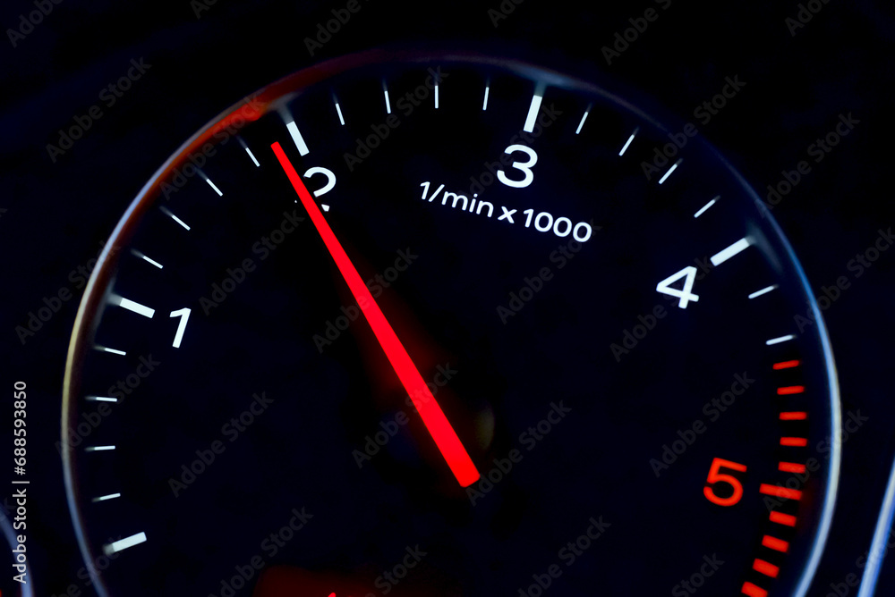 Car's dashboard.Modern car dashboard panel at night time.Closeup,selective focus. Car's dashboard.Modern car dashboard panel at night time.Closeup,selective focus.