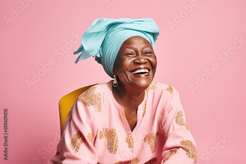 Happy Old Nigerian Woman On Pastel Background