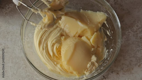 Whipping dough. Making cream or dough. Home cooking. Home cooking concept. Dynamic shooting