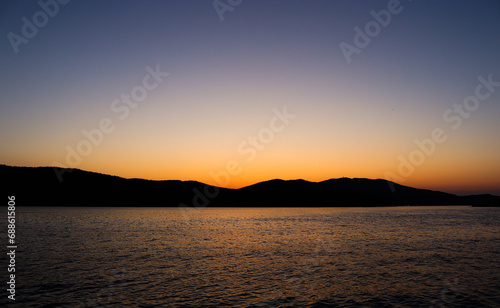Tourism and sea travel. Holidays at sea. Sunset over the sea.