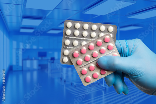 Doctor hand with pills. Ant...