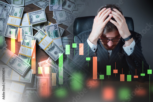 Sad business man. Guy grabs head. Investor near pile of money. Man and falling trader chart. Investor lost his invested money. Businessman became bankrupt. Sad investor learned about crisis
