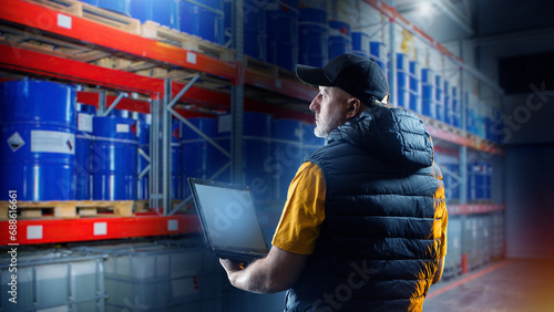 Man in fuel warehouse. Stor...