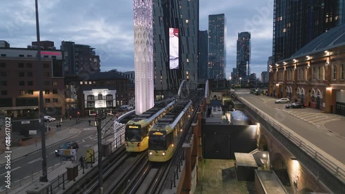 Aerial, trams and Tower of light, Deansgate, Manchester, England