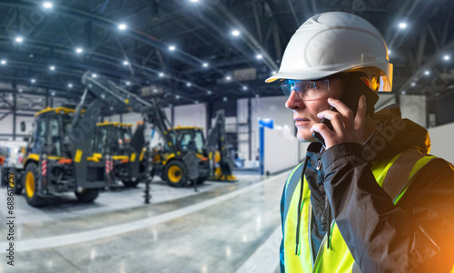 Man builder with phone. Pro...