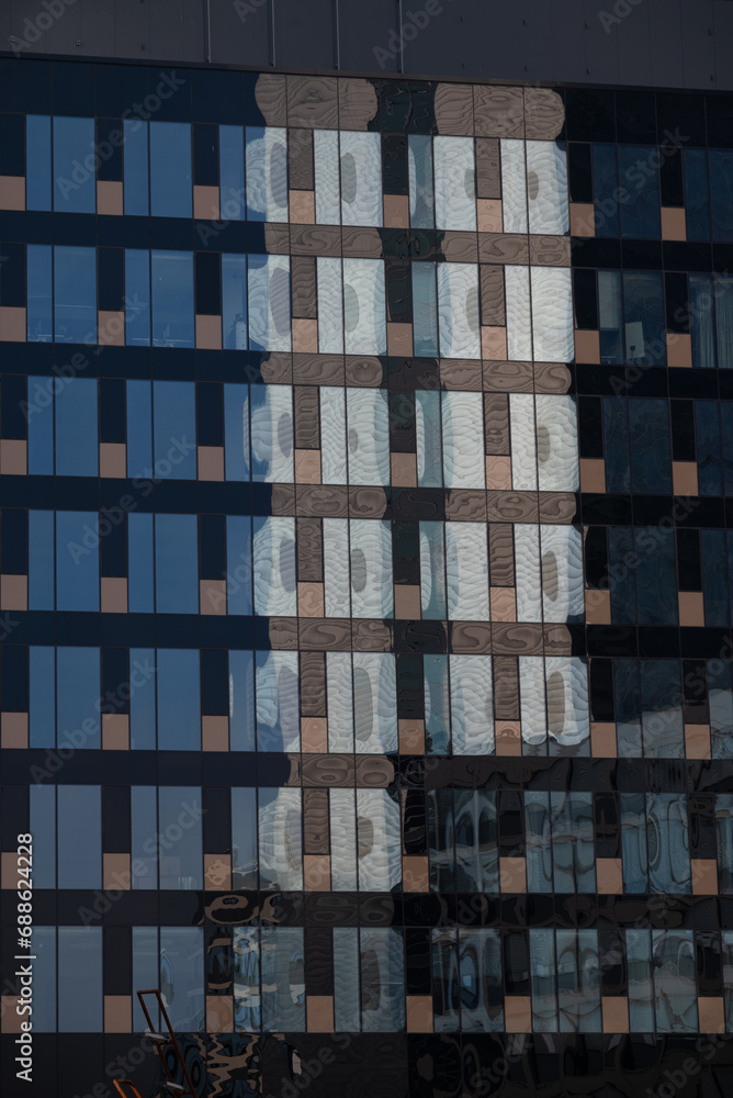 Obraz premium Kaleidoscope of Urban Life: Reflections on Glass