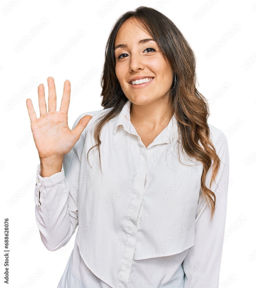 Young brunette woman wearing casual clothes showing and pointing up with fingers number five while smiling confident and happy. Young brunette woman wearing casual clothes showing and pointing up with fingers number five while smiling confident and happy.