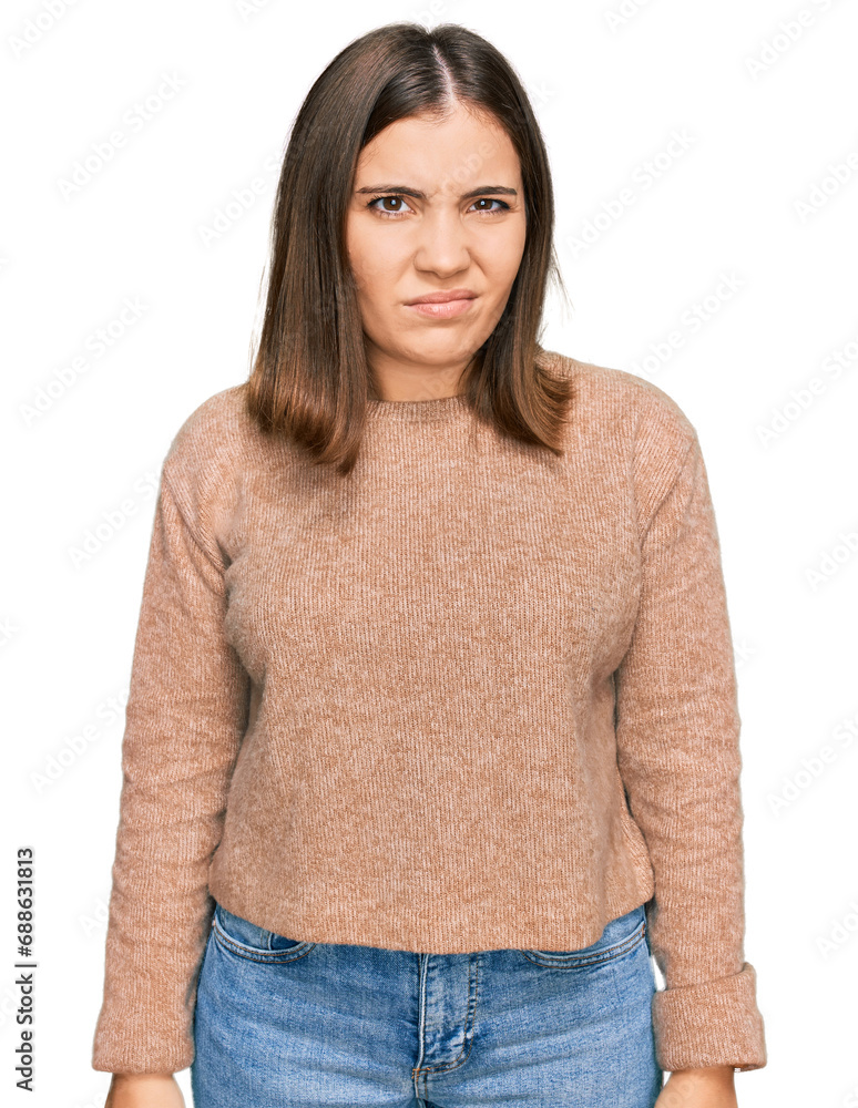 Young beautiful woman wearing casual clothes skeptic and nervous, frowning upset because of problem. negative person. Young beautiful woman wearing casual clothes skeptic and nervous, frowning upset because of problem. negative person.
