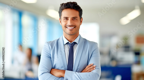 Smiling Indian Businessman On Blurred Office Background - legal AI photo