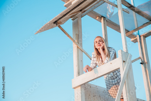 Woman on rescue tower on a walk travel vacation