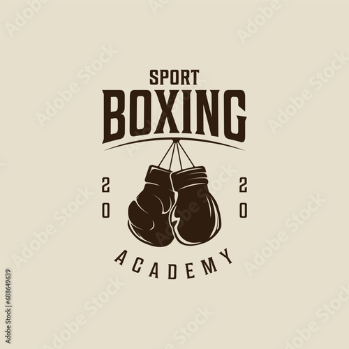 Boxing Gloves Hanging logo vector vintage illustration template icon graphic design. fight sport sign or symbol for academy or club for competition or shirt print with retro typography photo