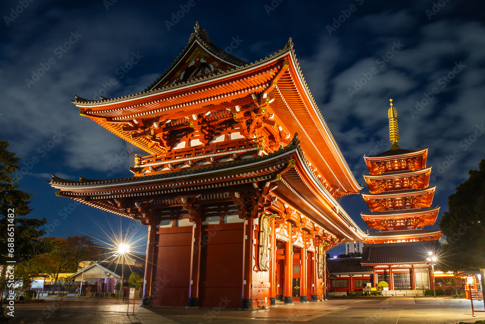 Asakusa, Tokyo, Japan - November 13, 2023 : Nighttime tourists and pilgrims at Sensoji Temple, symbolized by large red lanterns with light, are a popular destination. Asakusa, Tokyo, Japan - November 13, 2023 : Nighttime tourists and pilgrims at Sensoji Temple, symbolized by large red lanterns with light, are a popular destination.