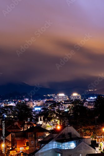 View on roofs in the city of Dalat. Da Lat and the surrounding area is a popular tourist destination of Asia. City with fogs and mountains