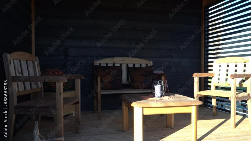 Small wooden house in the countryside during autumn season Small wooden house in the countryside during autumn season
