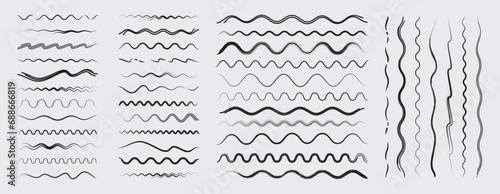 Set of various vector wavy line dividers photo